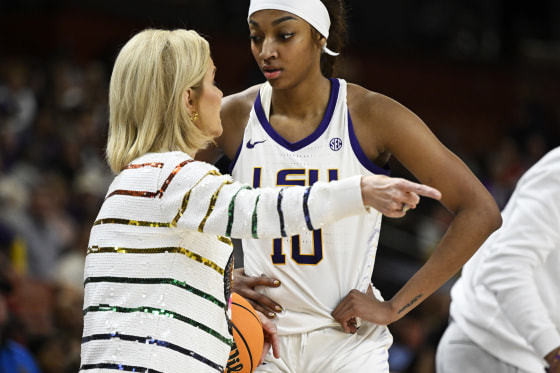 Head coach Kim Mulkey of the LSU Lady Tigers talks with Angel Reese #10 of the LSU Lady Tigers in the third quarter during the semifinals of the SEC Women's Basketball Tournament at Bon Secours Wellness Arena on March 09, 2024 in Greenville, South Carolina. 