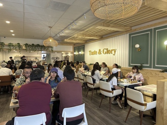 Customers eat weekend brunch items at Taste & Glory restaurant in San Mateo, Calif., on Saturday, Aug. 17, 2024. 