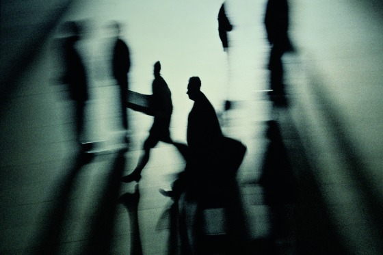 SILHOUETTES OF BUSINESS PEOPLE (BLURRED MOTION,  B&W)