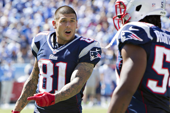 Aaron Hernandez #81 talks with teammate Dont'a Hightower 354 of the New England Patriots during the season opener against the Tennessee Titans at LP Field on September 8, 2012 in Nashville, Tennessee.  The Patriots defeated the Titans 34 to 13. 