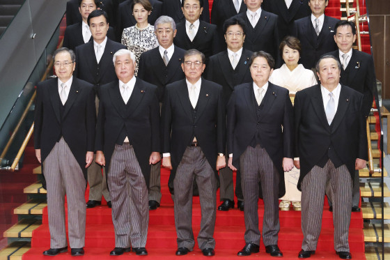 Japan's government admitted on October 7 manipulating an official photo of the new cabinet to make its members look less unkempt, after online mockery of their sagging trousers. In the official photo issued by Ishiba's office, these blemishes had mysteriously disappeared, but not quickly enough to stop a barrage of mockery of the "untidy cabinet" on social media.