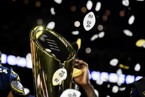 Detail view of the trophy as Michigan Wolverines players celebrate winning the 2024 CFP National Championship game n Houston on Jan. 8, 2024.