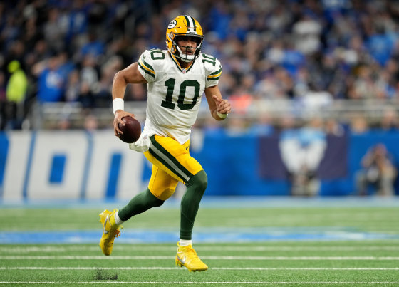 Jordan Love of the Green Bay Packers runs with the ball against the Detroit Lions on Dec. 5, 2024,   in Detroit.