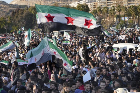 Image: Syrians celebrate at the first Friday prayers since Bashar al-Assad's ouster at the central square in Damascus, Syria, on Dec. 13, 2024.