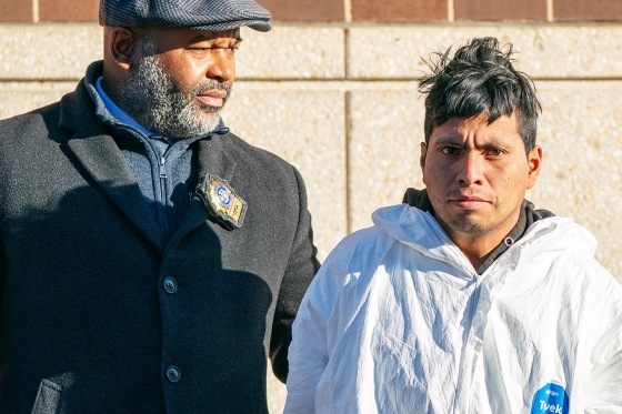 Sebastian Zapeta-Calil is escorted outside the NYPD  60th Precinct in Brooklyn 