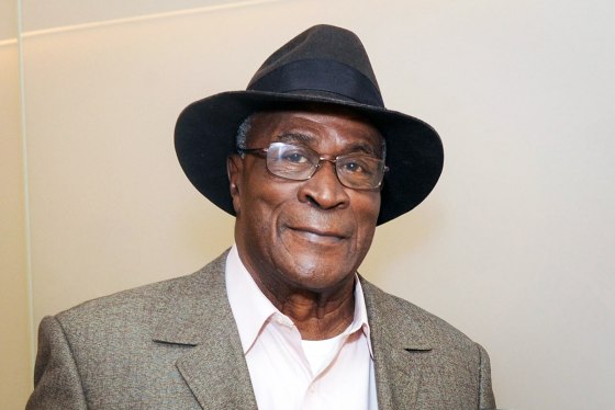 John Amos smiles for a photo