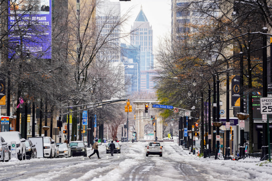 A street in Atlanta covered in ice and snow.