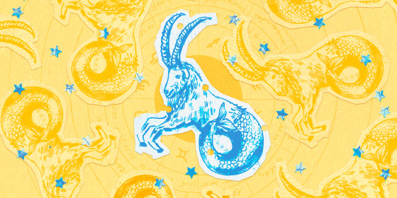 Paper cutouts of the Capricorn zodiac on a yellow background