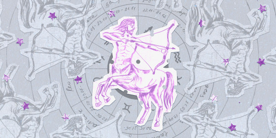 Paper cutouts of the Sagittarius zodiac on a gray background