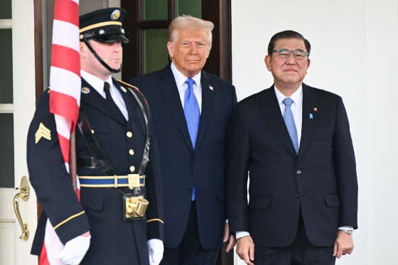 Image: President Donald Trump greets Japanese Prime Minister Shigeru Ishiba
