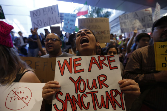 People protest President Donald Trump's travel ban at the Tom Bradley International Terminal at LAX on January 29, 2017 in Los Angeles, California. 