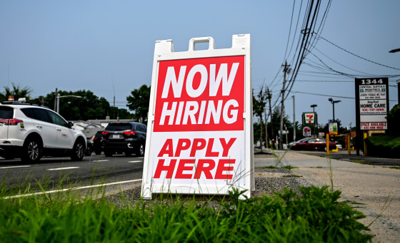 A now hiring sign in Long Island in July 2021.