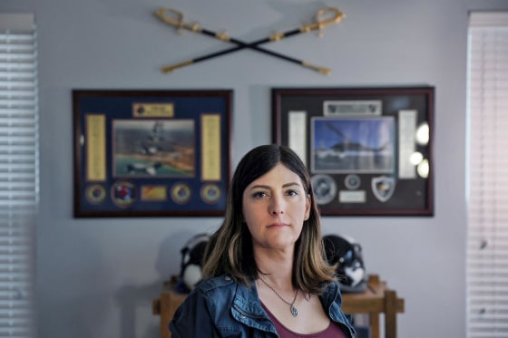 Emily Shilling, a commander in the U.S. Navy and the president of SPARTA poses for a picture at her home in California, Maryland