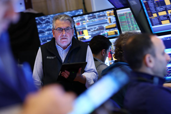 Traders work on the floor of the New York Stock Exchange during morning trading on April 11, 2025 in New York City. 