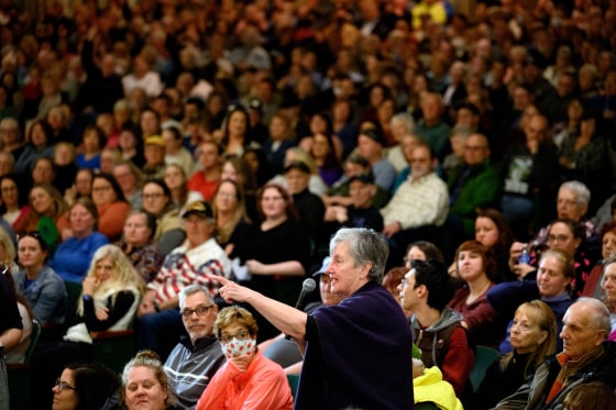 An attendee asks a question.