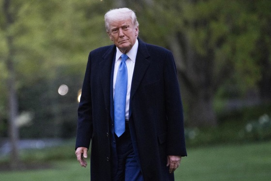 President Donald Trump walks on the South Lawn of the White House
