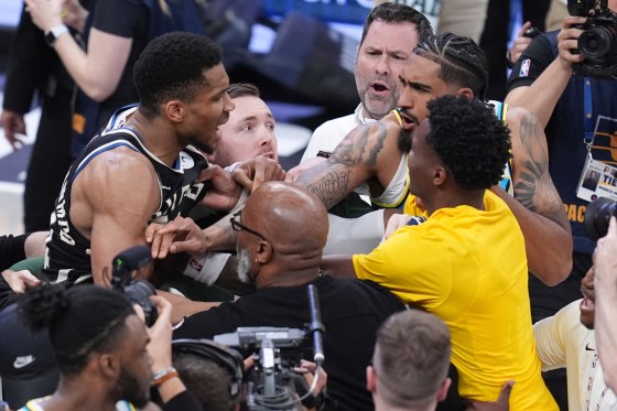 Milwaukee Bucks forward Giannis Antetokounmpo, left, is separated from Indiana Pacers players forward Obi Toppin, second from right, and guard Bennedict Mathurin