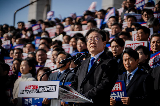 Lee Jae-myung addresses a crowd at the National Assembly in Seoul, South Korea.