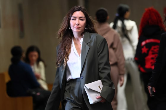 Miriam Haley on her way to the courtroom