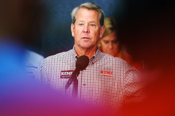 Brian Kemp speaks at a press conference