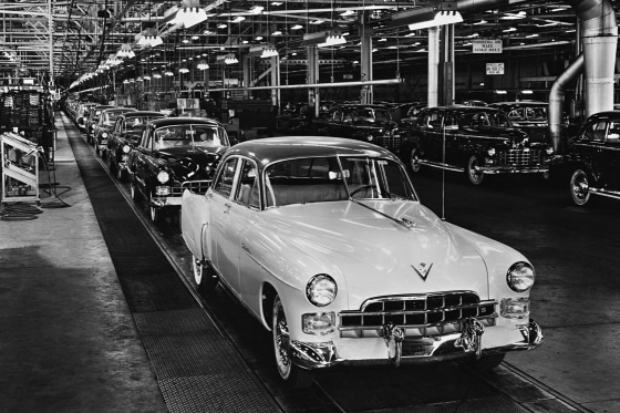 Cadillacs rolling off the assembly line in Detroit.