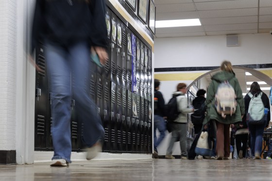 Students in the hallway of the Woodson Independent School District location