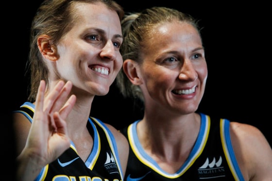 Allie Quigley, on the left, and Courtney Vandersloot smiles next to each other while posing for a photo