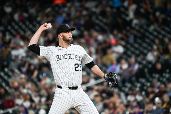 Jacob Stallings prepares to throw a ball while on the field