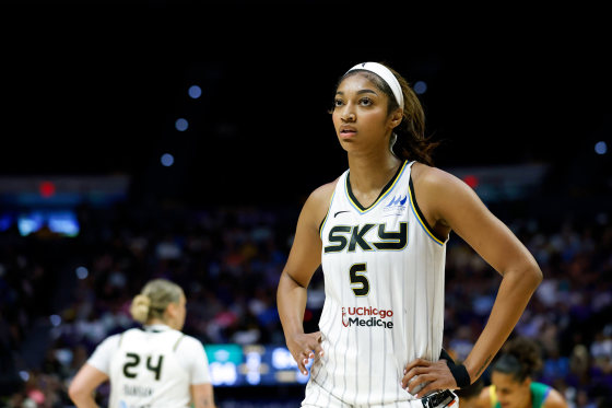 Angel Reese stands on the basketball court