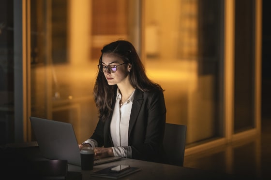 Businesswoman using computer in office