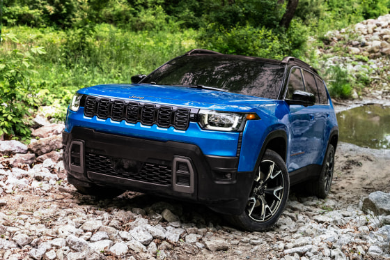 A blue 2025 Jeep Cherokee SUV