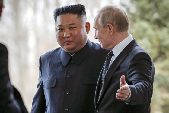 Vladimir Putin and Kim Jong Un.