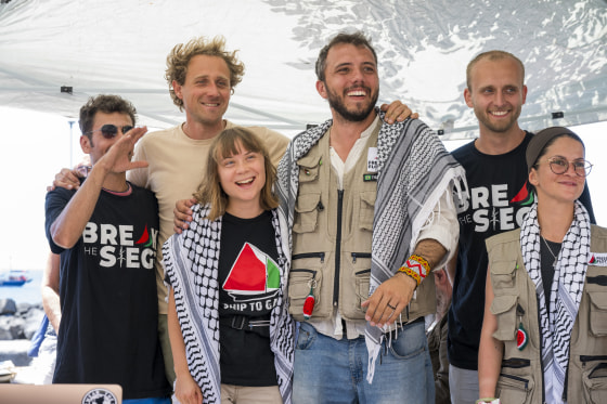 Greta Thunberg and crew members aboard the Madleen before‌ departing for Gaza.