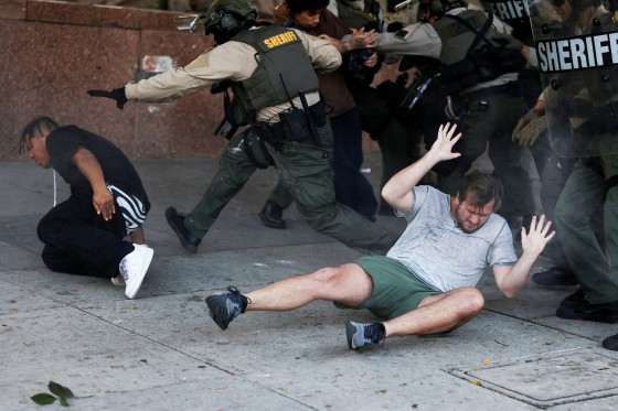 Protesters react on the ground 