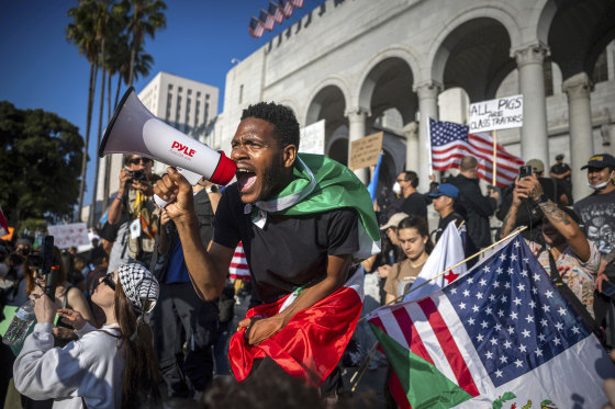 Immigration Protests Los Angeles crowd megaphone
