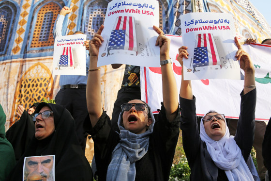 Iranians gather at the Revolution Square in Tehran to protest US attacks