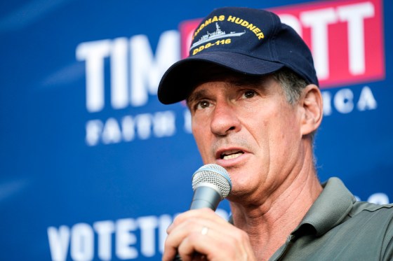 Scott Brown speaks into a microphone