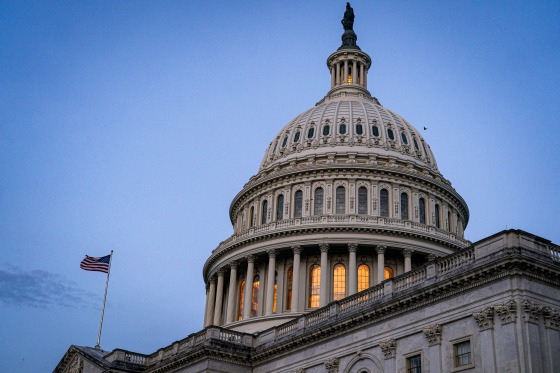 Federal workers and contractors affected by government shutdown outside government buildings