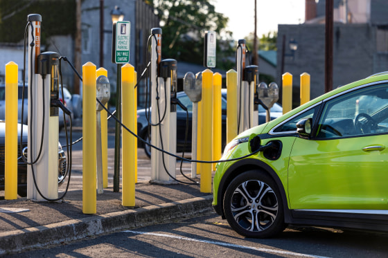 A Chevrolet Bolt charges at a ChargePoint electric vehicle charging station.