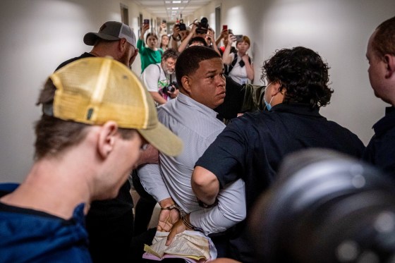 ICE Detains migrant.