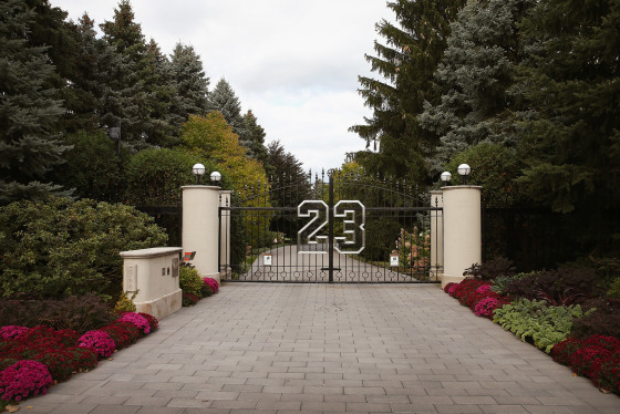 A gate with the number 23 seen outside