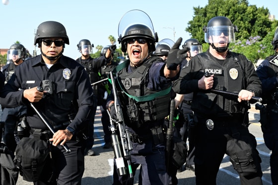 Police outside the federal building in Los Angeles on June 9 amid protests over immigration raids. Police outside the federal building in Los Angeles on June 9 amid protests over immigration raids.