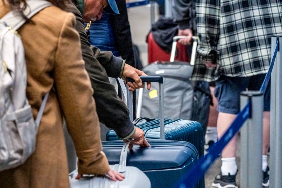 Travelers At SFO Airport.