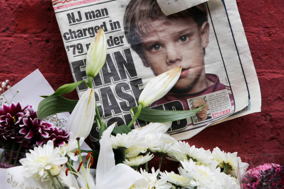 A newspaper with a photograph of Etan Patz on a makeshift memorial
