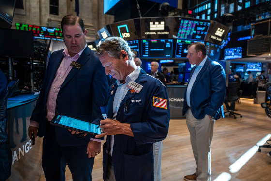 Image: Traders Work On The Floor Of The New York Stock Exchange Day After Trump Announced EU Trade Deal