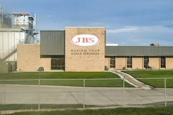 A JBS building exterior with the local on the front facing brick wall