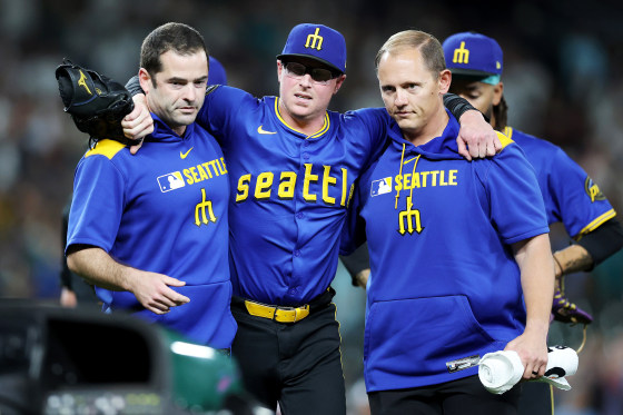 Mariners pitcher Trent Thornton carted off the field after coming off the  mound for a ground ball