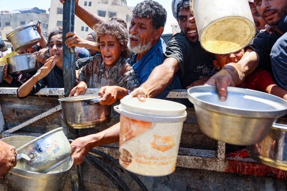 Palestinians seeking food.