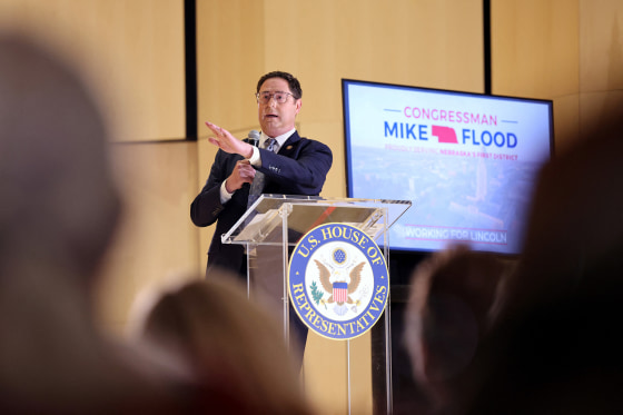 U.S. Representative Mike Flood (R-NE) answers questions from constituents during a town hall in Lincoln, Nebraska