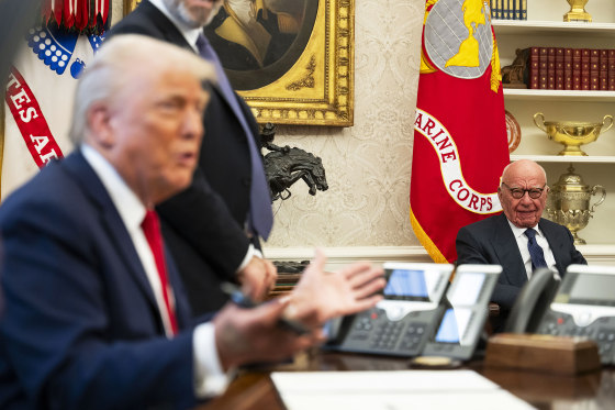 Media mogul Rupert Murdoch looks on as President Donald Trump speaks